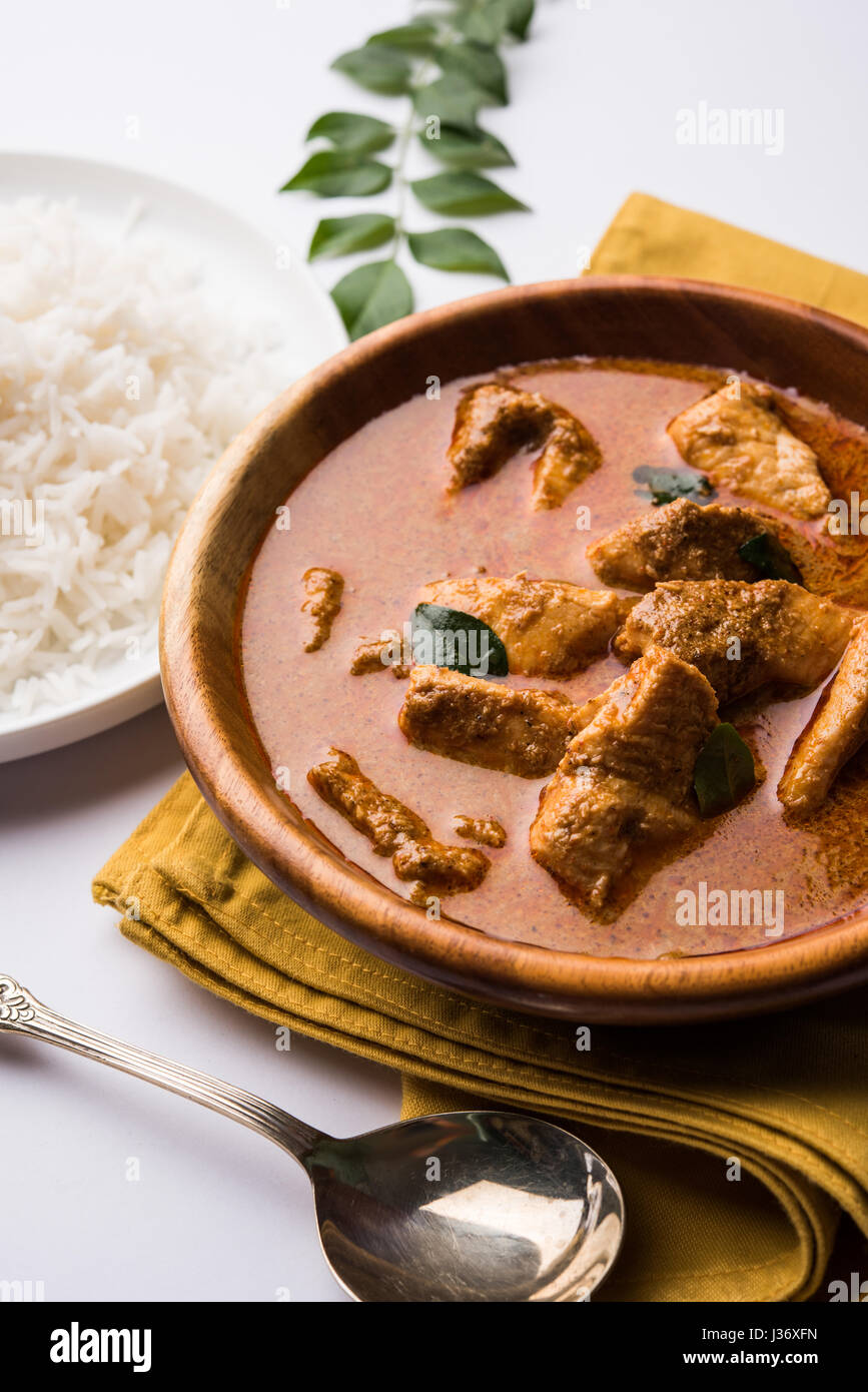 tasty fish curry served with white cooked basmati rice with curry