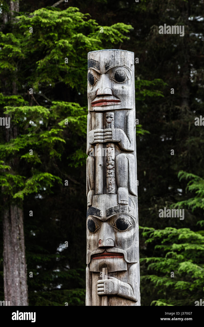 Totem poles in Alaska Stock Photo - Alamy