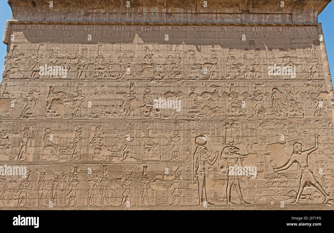 Hieroglypic carvings on wall at the ancient egyptian temple of Khnum in ...