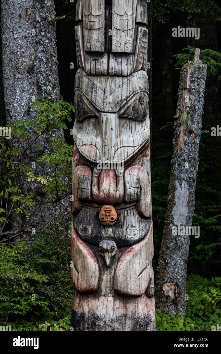 Totem poles in Alaska Stock Photo - Alamy