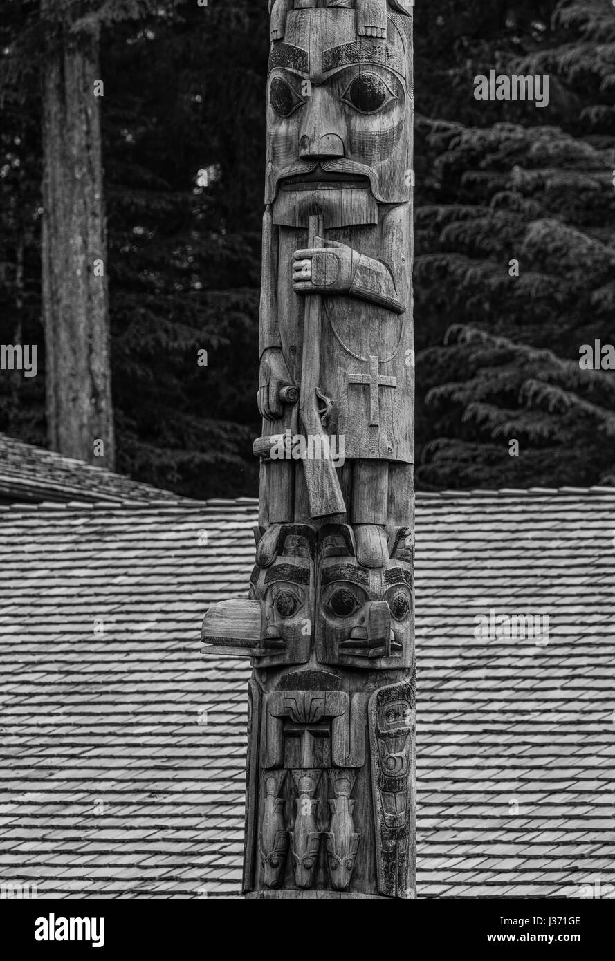 Native American Tlingit totem Poles in Sitka, Alaska. Stock Photo