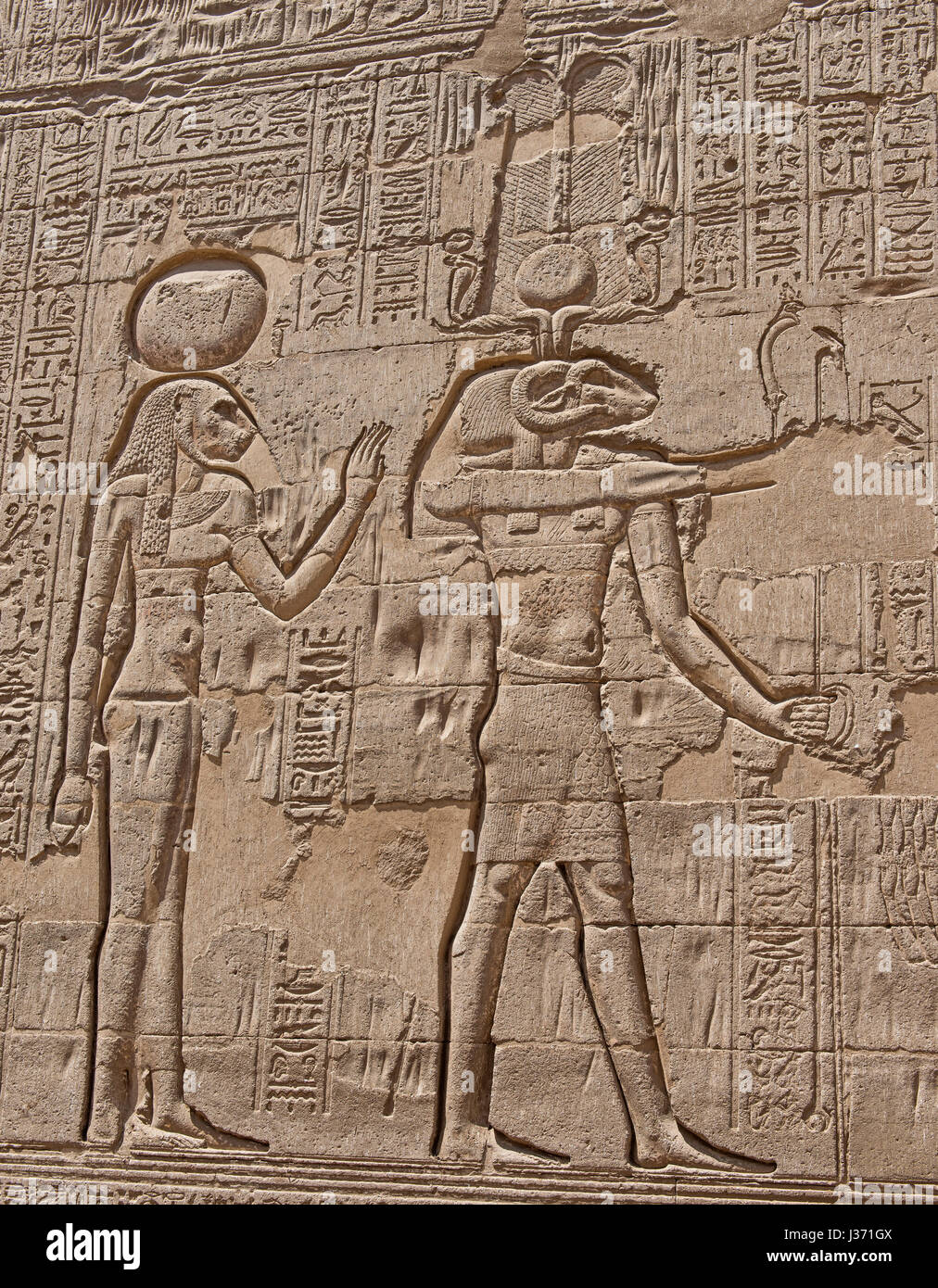 Hieroglypic carvings on wall at the ancient egyptian temple of Khnum in ...