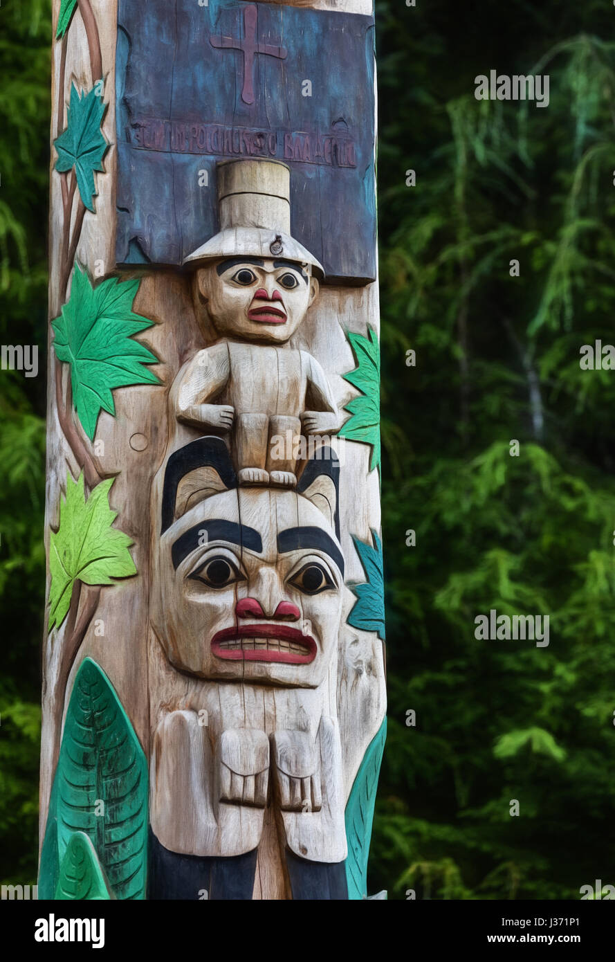 Native American Tlingit totem Poles in Sitka, Alaska. Stock Photo