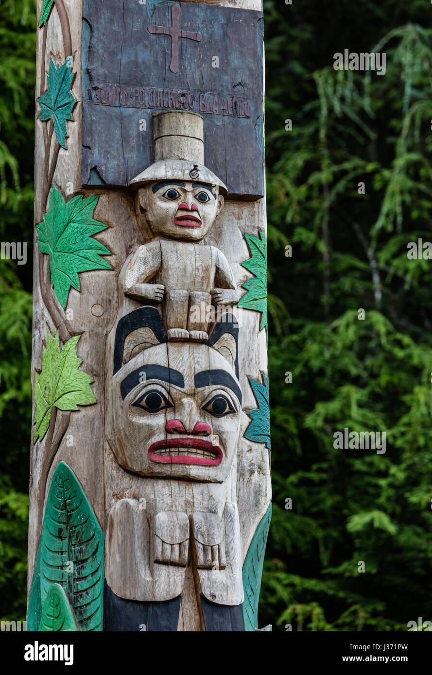 Totem poles in Alaska Stock Photo - Alamy