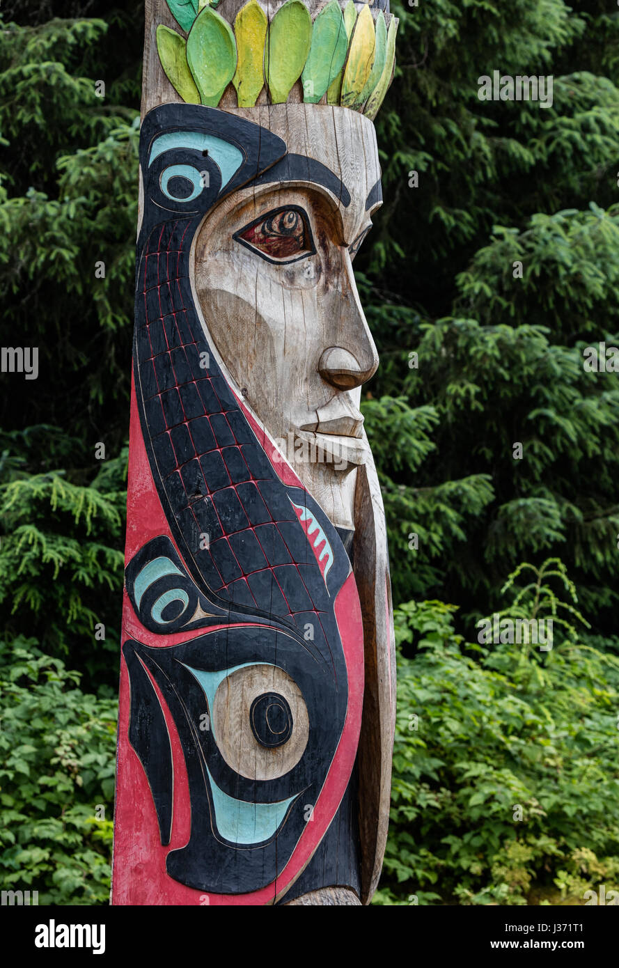 Totem poles in Alaska Stock Photo - Alamy