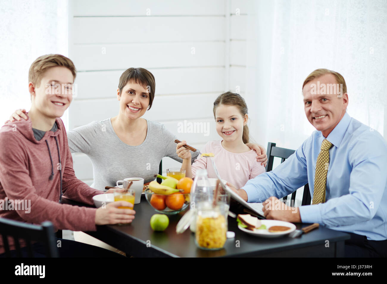 Family Idyll at Breakfast Stock Photo