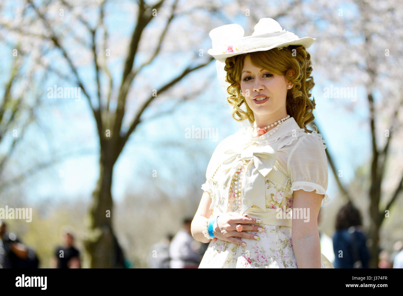 Stephanie Altmiller of Feasterville, PA shows of her authentic Japanese Lolita-style street fashion she purchase second hand, as she poses during the  Stock Photo