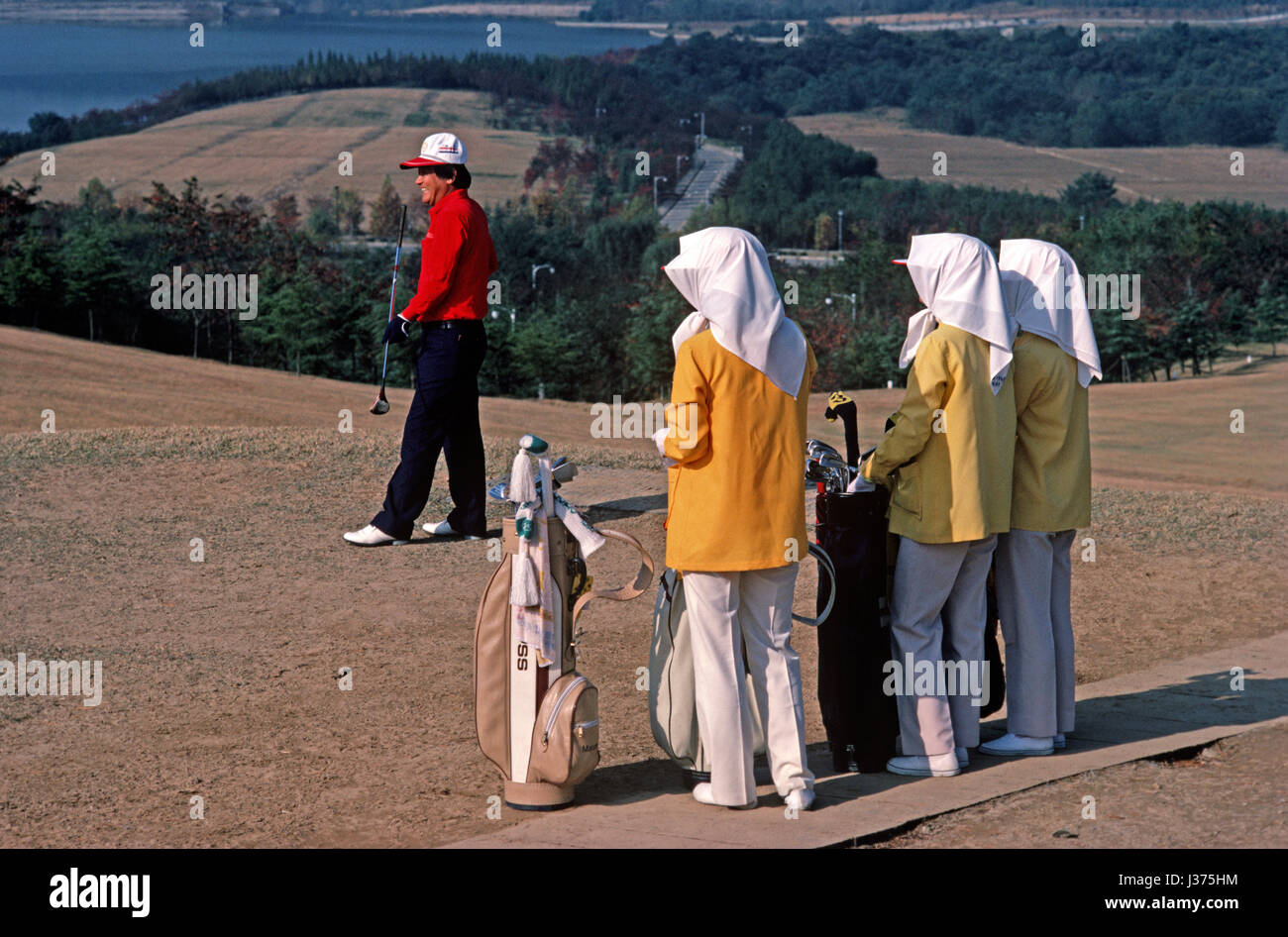 Girl golf caddies hires stock photography and images Alamy