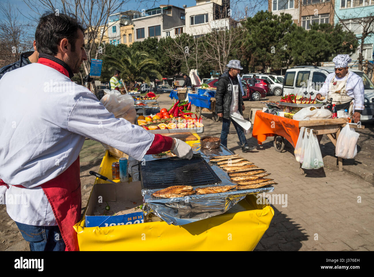 Preparing grilled mackerel sandwiches at a stall on Karakoy waterfront