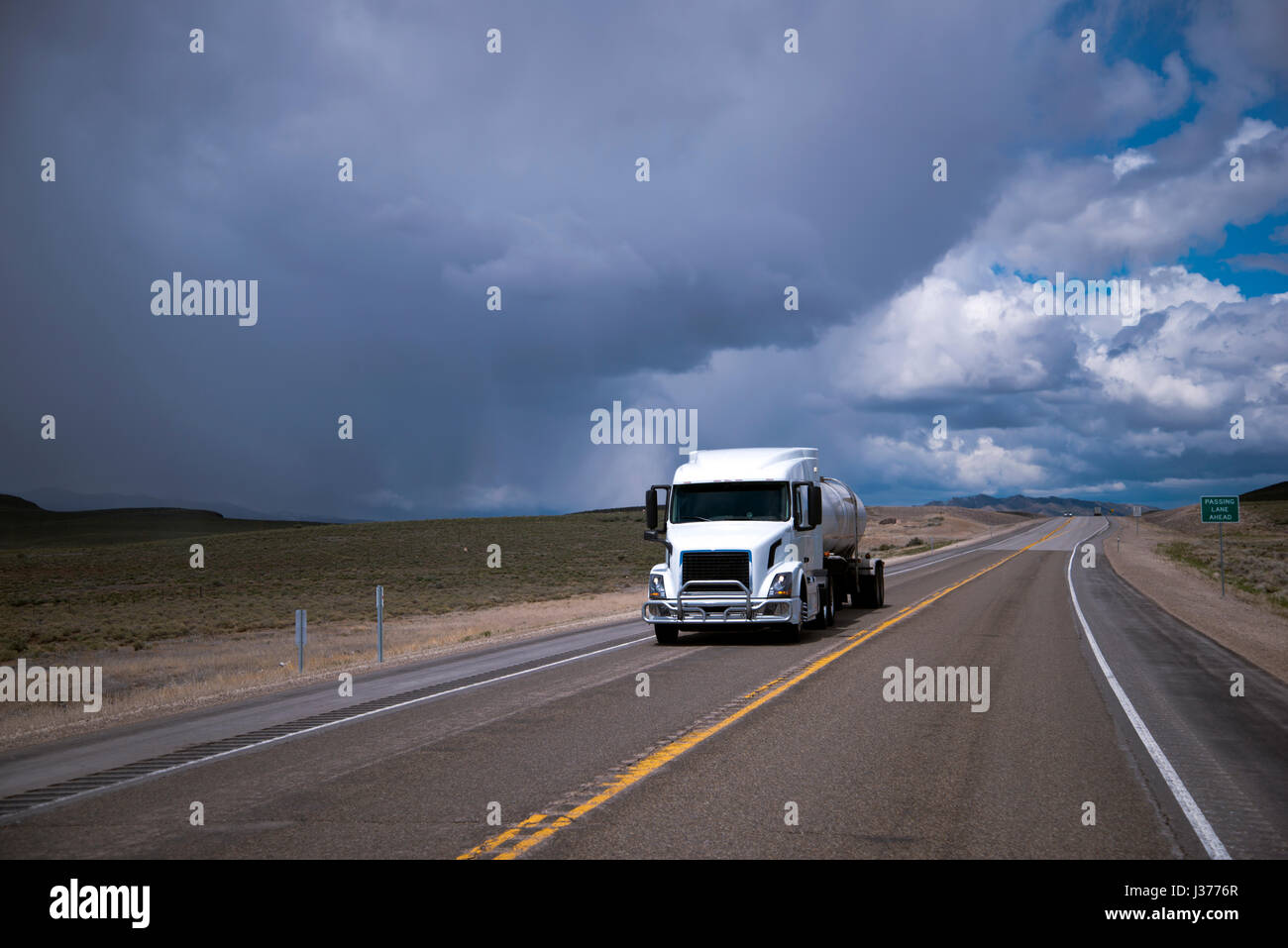 Modern popular comfortable semi truck with a cargo of liquid in the