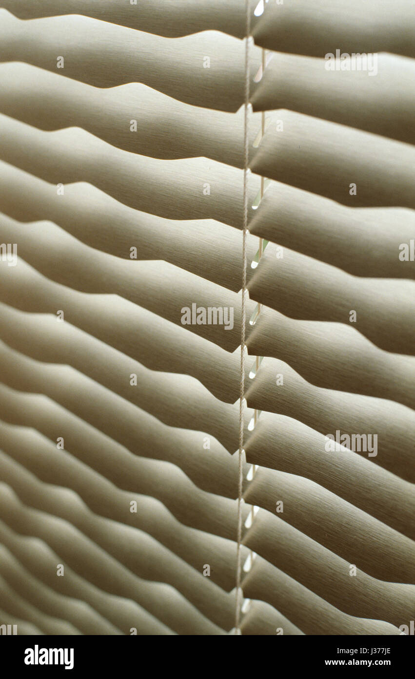 Closed white blinds. Stock Photo