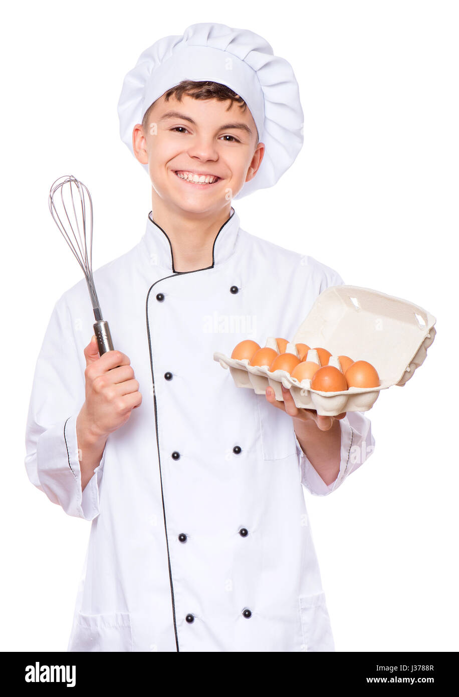 Teen boy wearing chef uniform Stock Photo Alamy