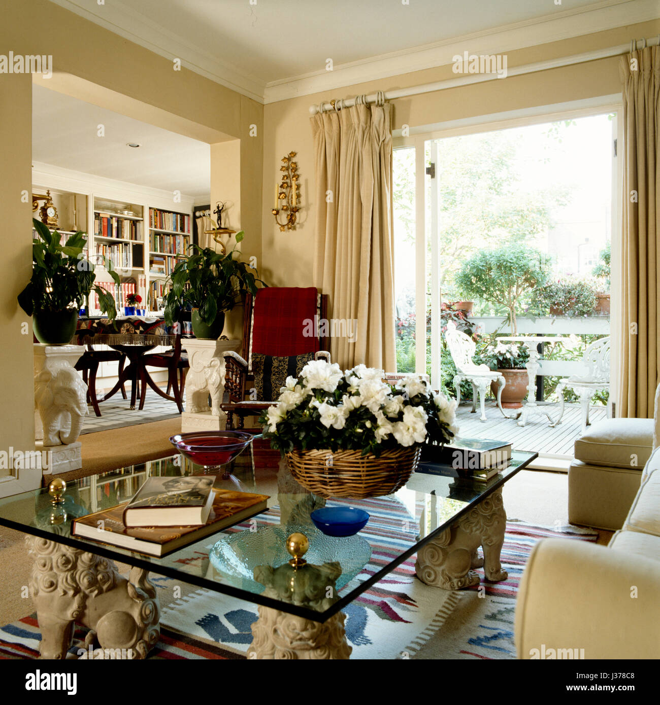 Picture of Living room with glass coffee table Stock Photo - Alamy