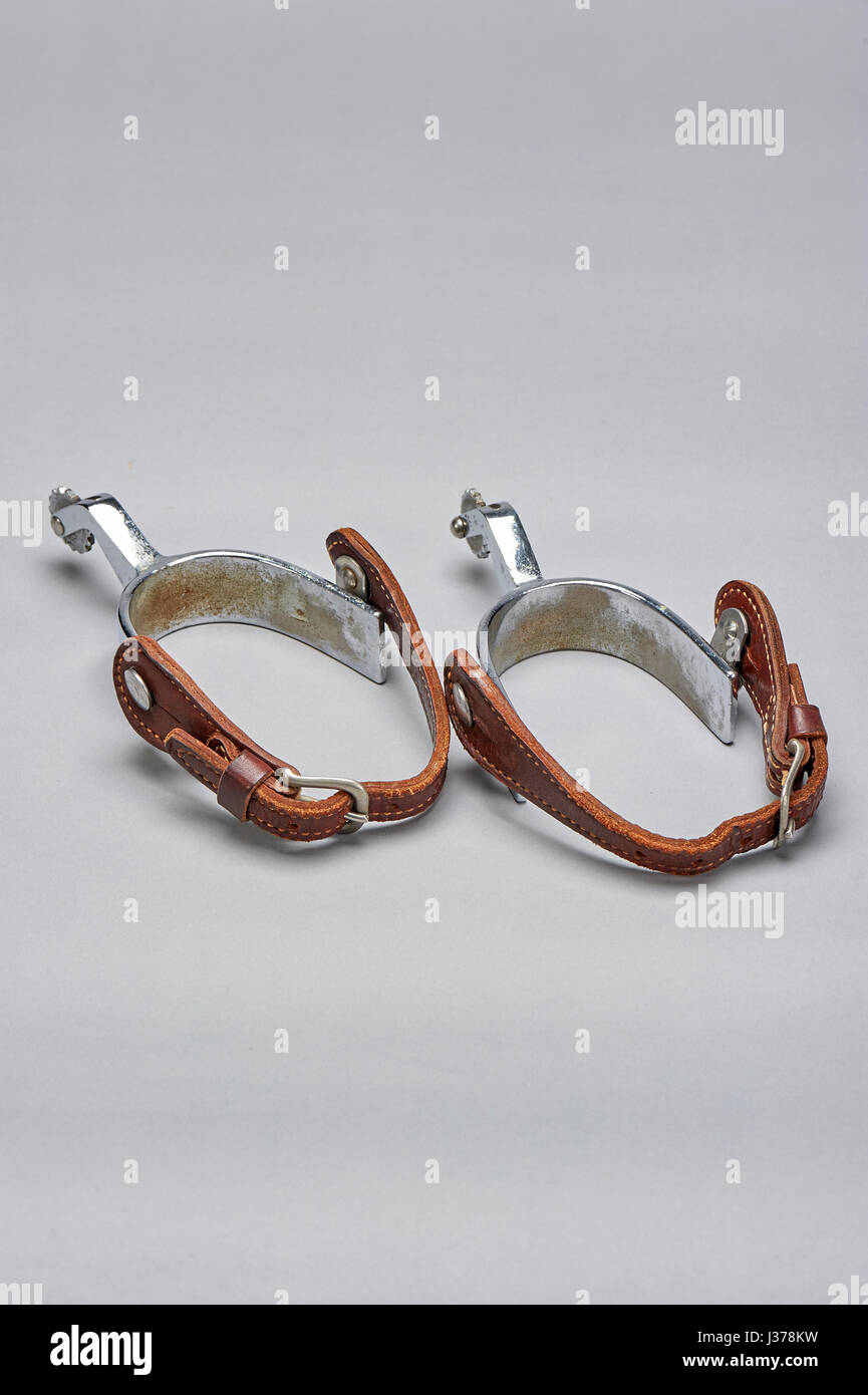 Spurs(cowboy gear used on heel of boot to urge horse forward) Stock Photo