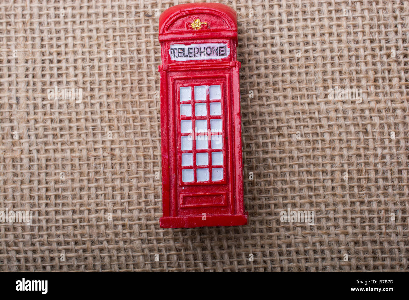 Red color phone booth on a canvas background Stock Photo - Alamy