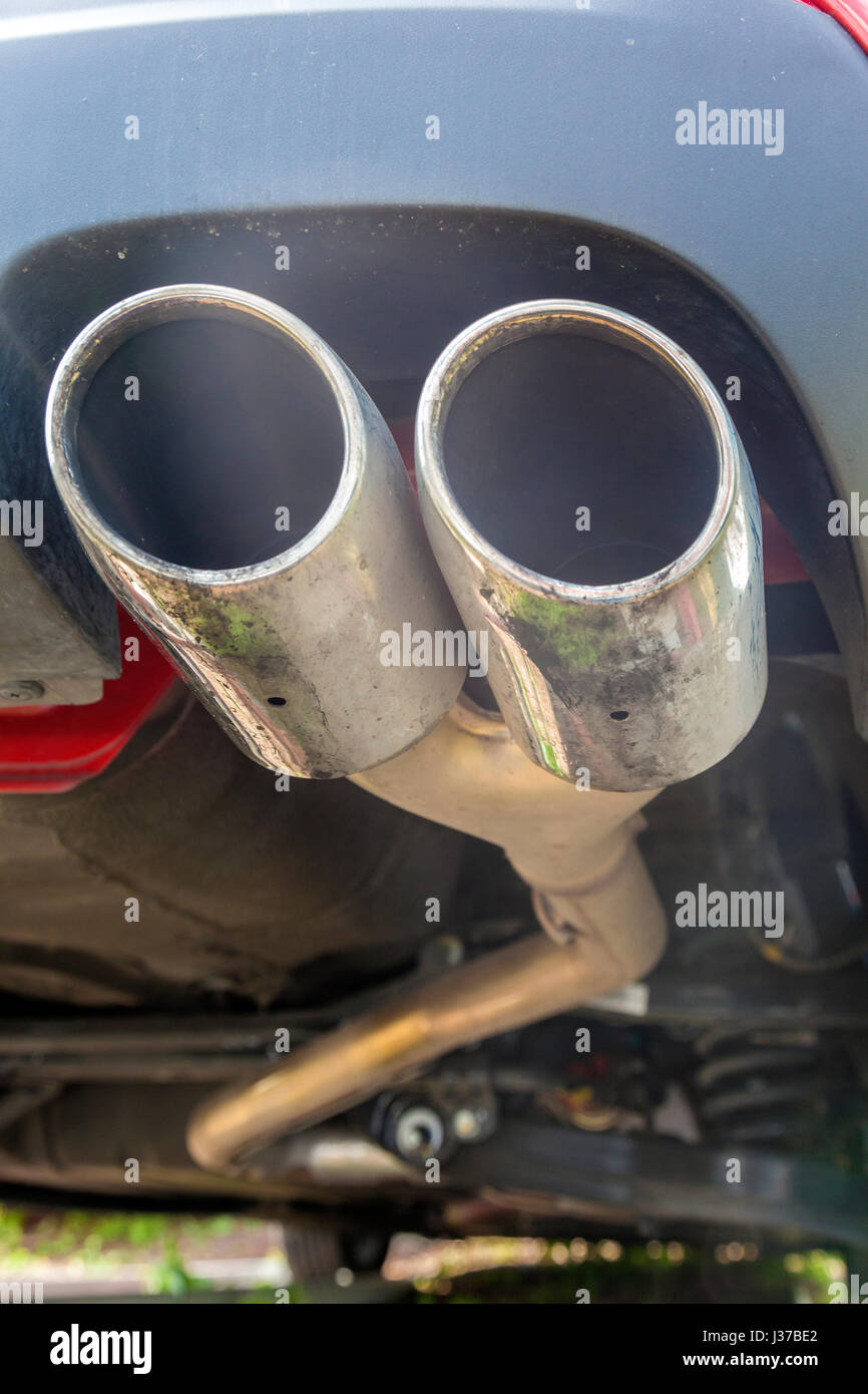 Closeup of a car exhaust. Double pipe from a diesel engine Stock Photo