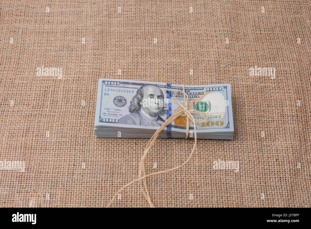 Bank Notes Ribbons Banknote bundle of US dollar tied with colorful a ribbon Stock Photo ...