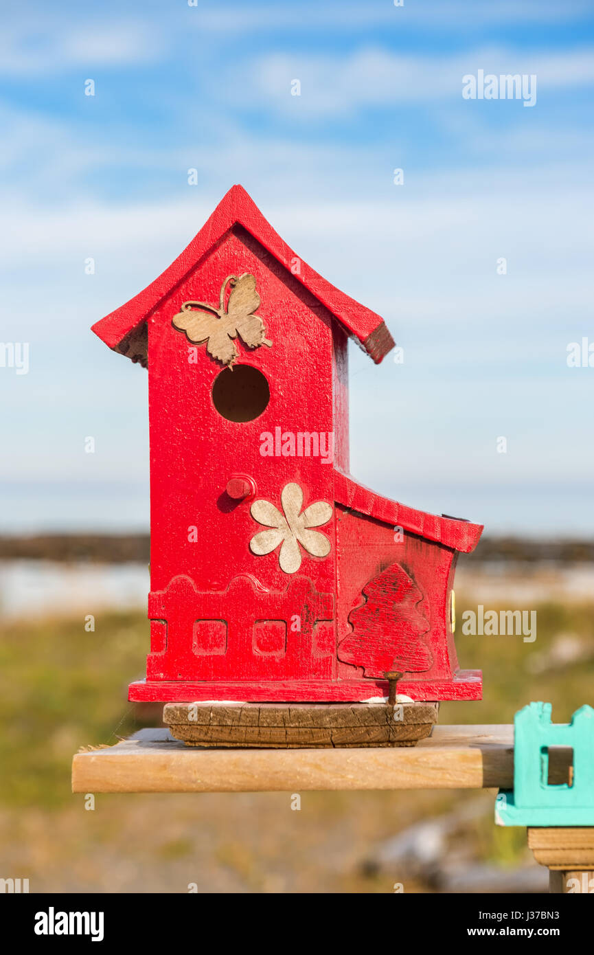 Close up of tiny and colorful wood house. Illustration for Real Estate or Construction. Stock Photo
