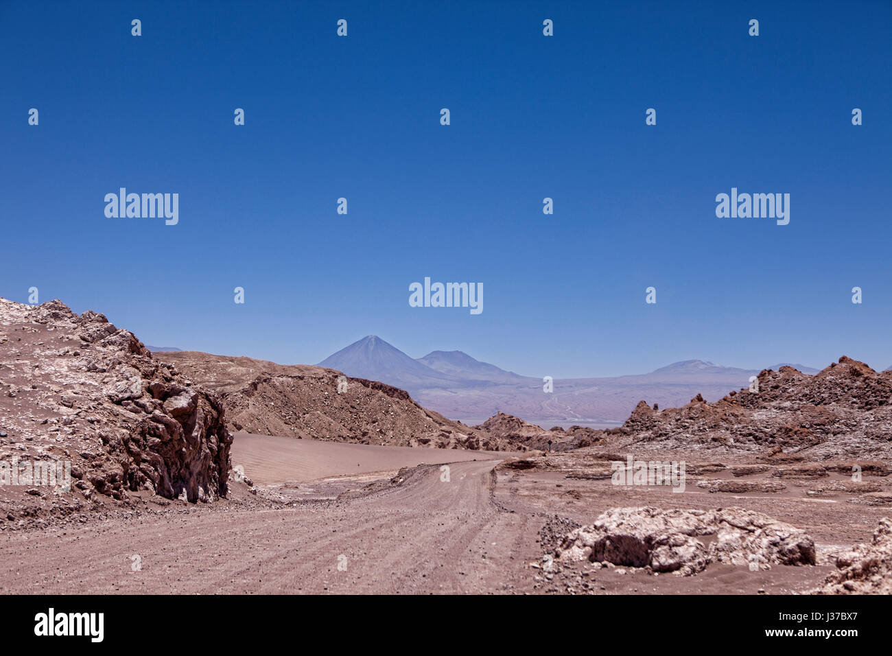 Looking down the road in the Valley of the Moons, Atacama Desert, Chile. Stock Photo