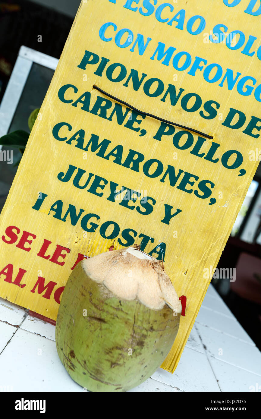 Menu board and coconut, kiosks, Luquillo, Puerto Rico Stock Photo