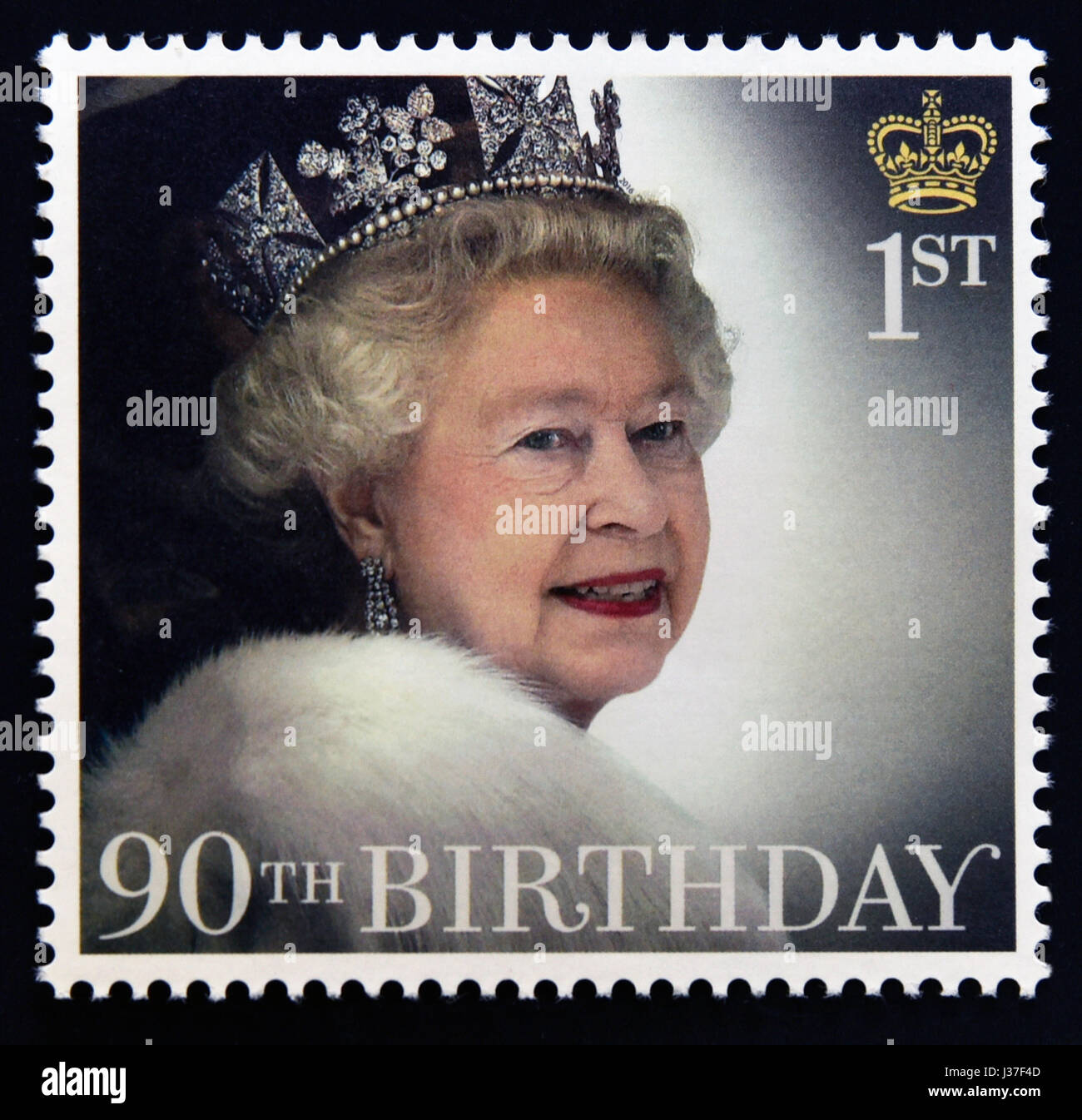 Postage stamp. Great Britain. Queen Elizabeth II. 2016. HM The Queen's 90th Birthday. HM The Queen attends the State Opening of Parliament 2012. Stock Photo