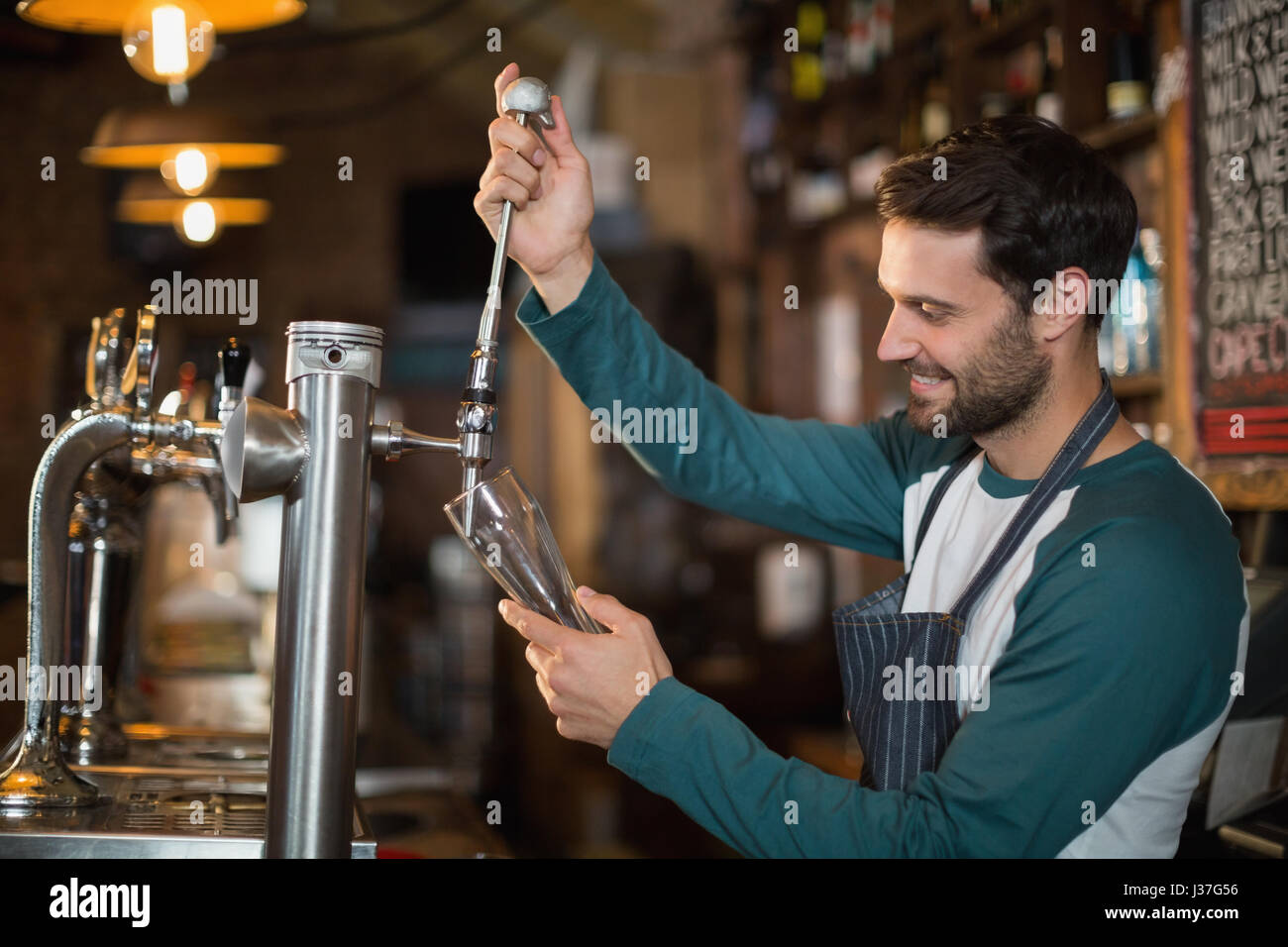 Bartender beer hires stock photography and images Alamy