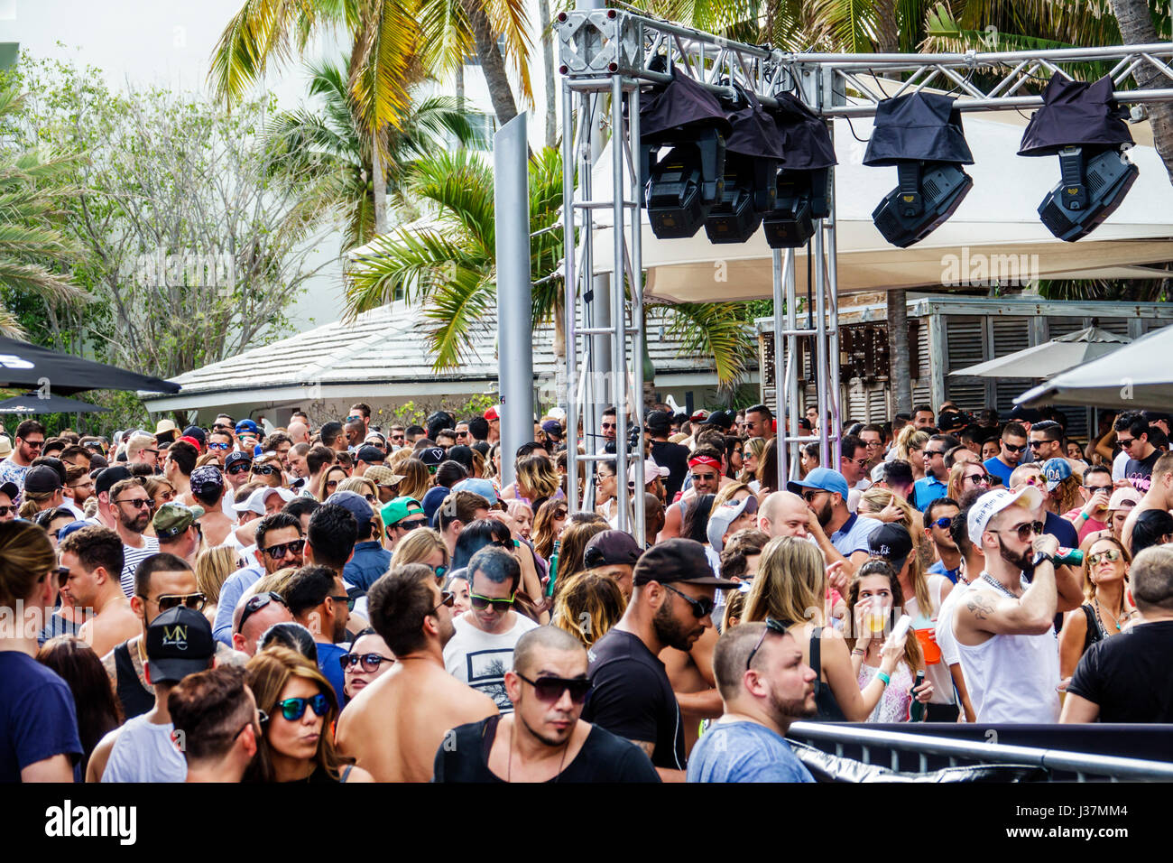 Miami Beach Florida,Miami Music Week,hotel pool party,crowd,standing