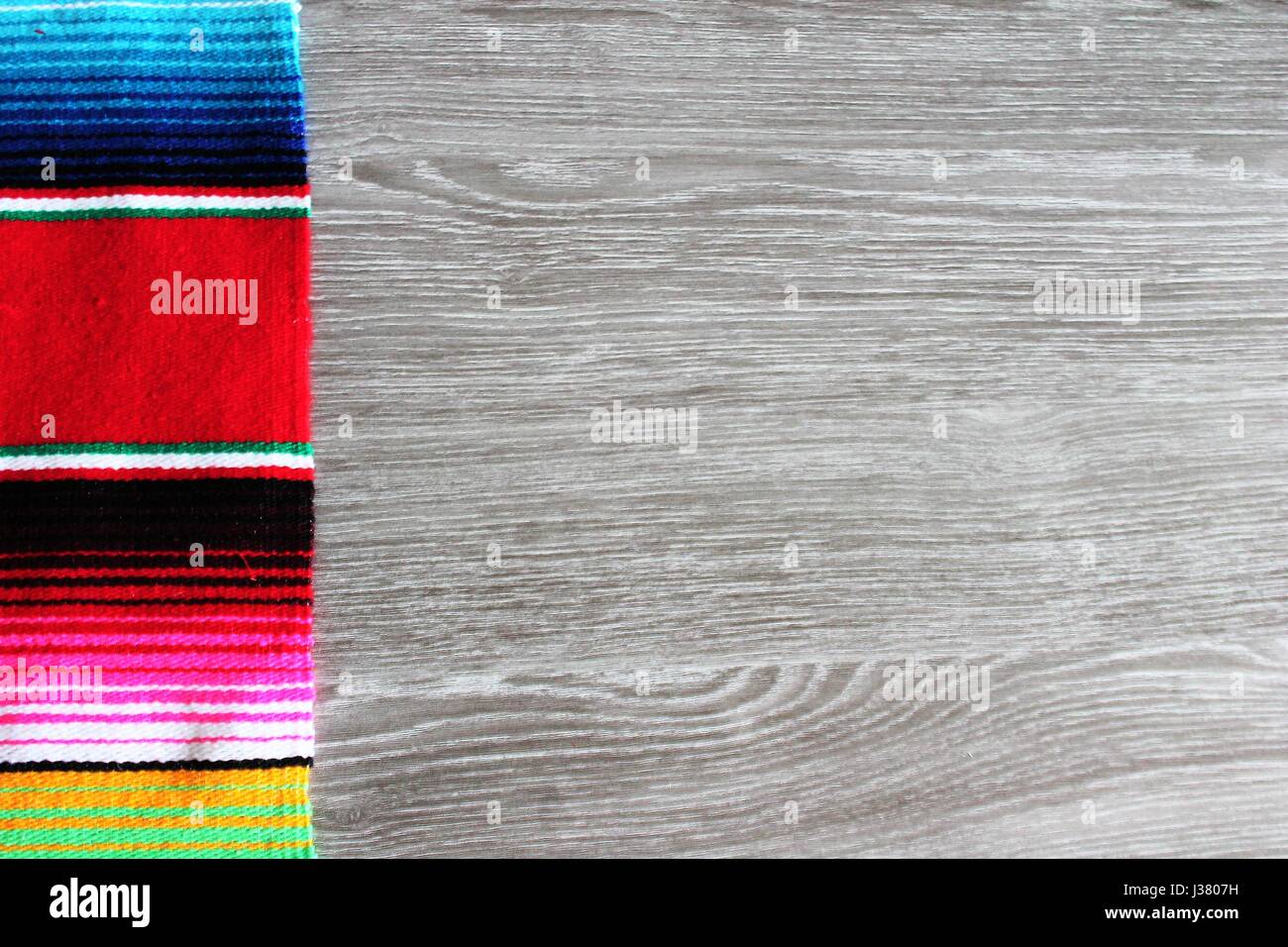 poncho serape background Mexican cinco de mayo fiesta wooden copy space