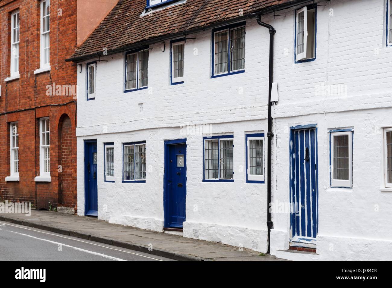 Row of old terraced cottages in Winchester, Hampshire, England Stock Photo