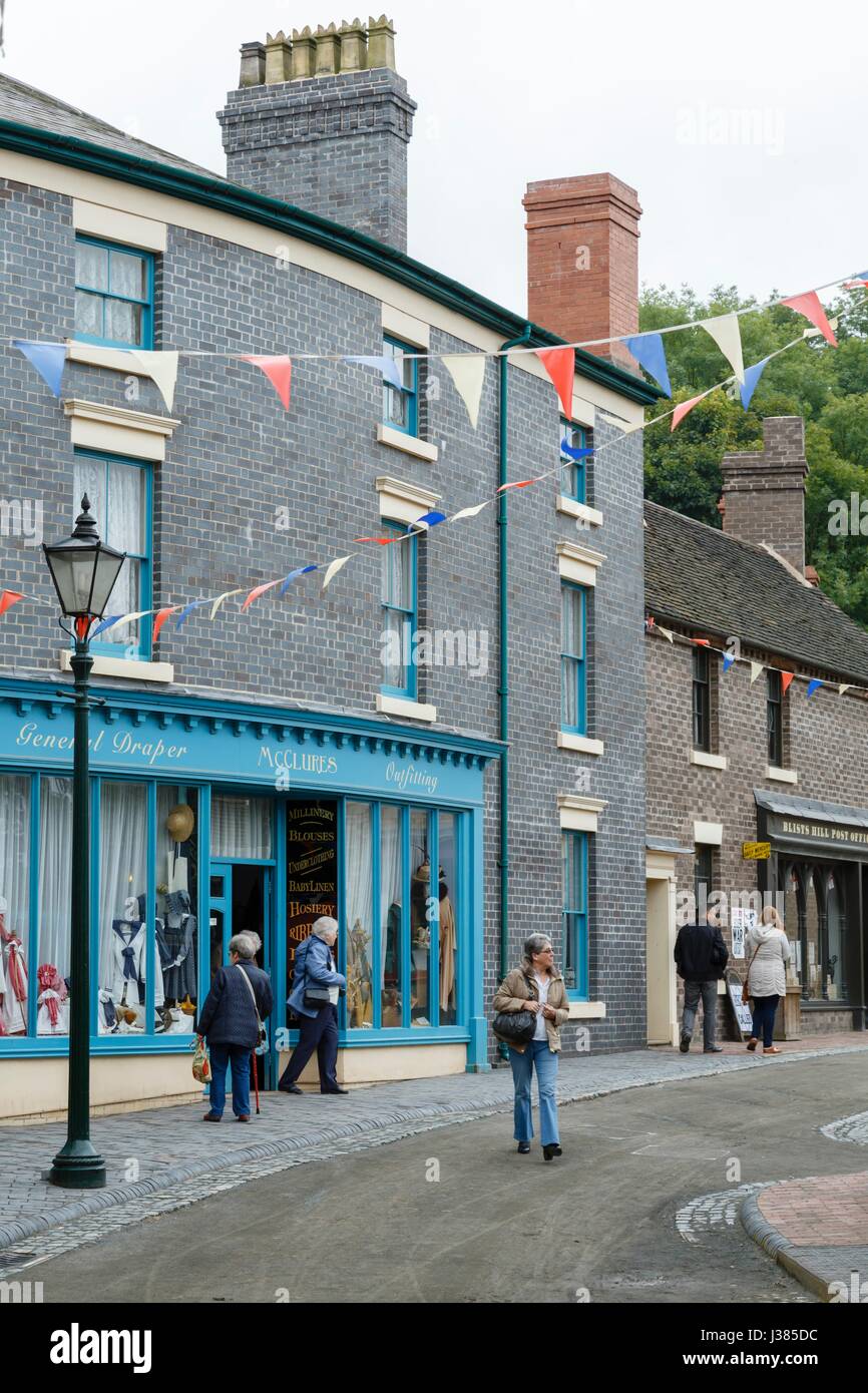 Traditional victorian shops along an old street in Blists Hill Museum, Ironbridge, Shropshire, UK Stock Photo