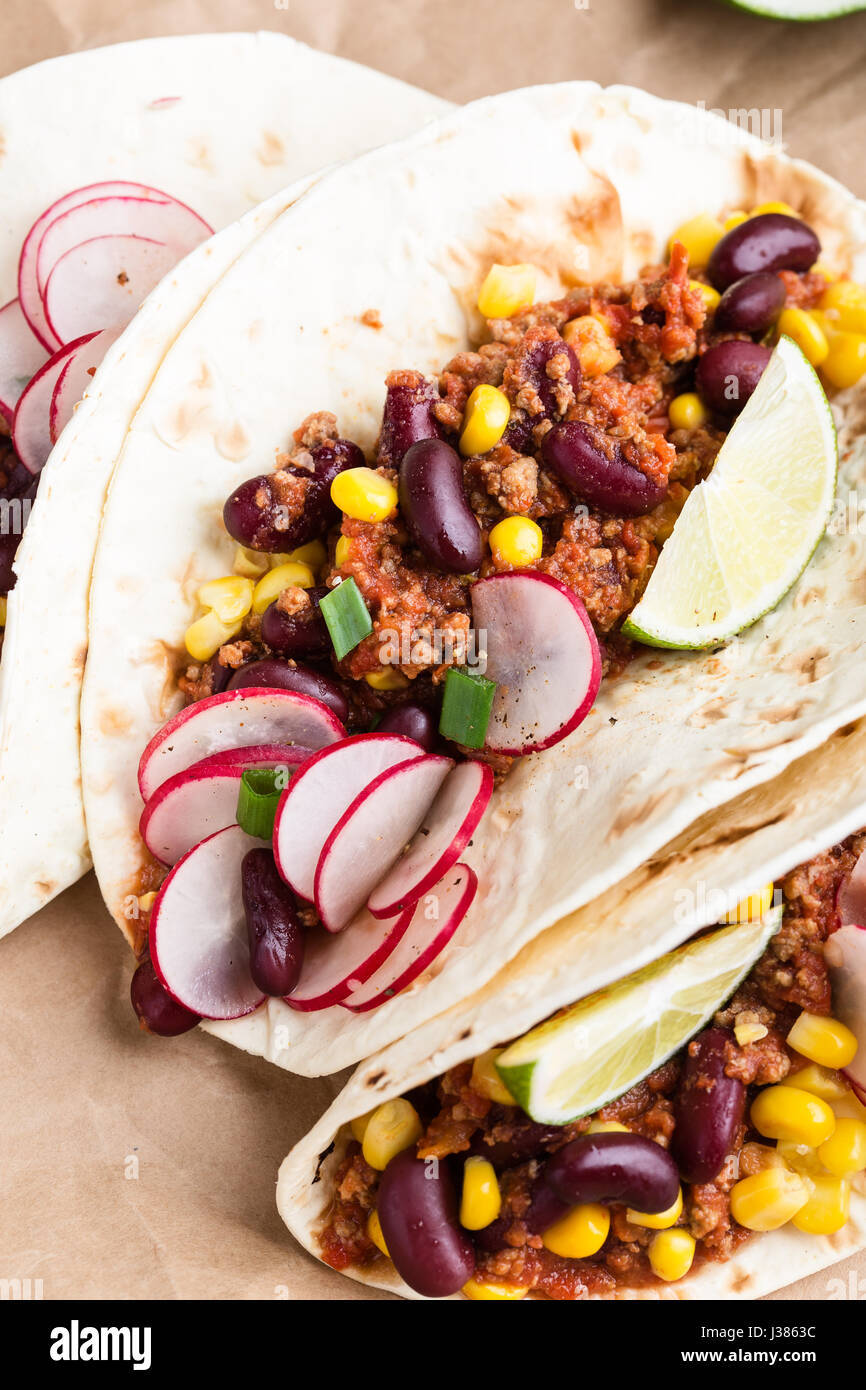 Chili con carne tacos on craft paper, Mexican traditional food Stock