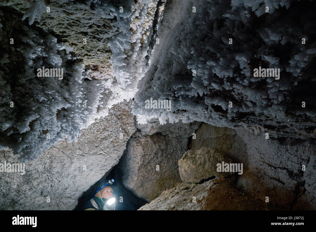 Girl speleologist. Cave in the Pinega region .Arhangelsk region Stock Photo