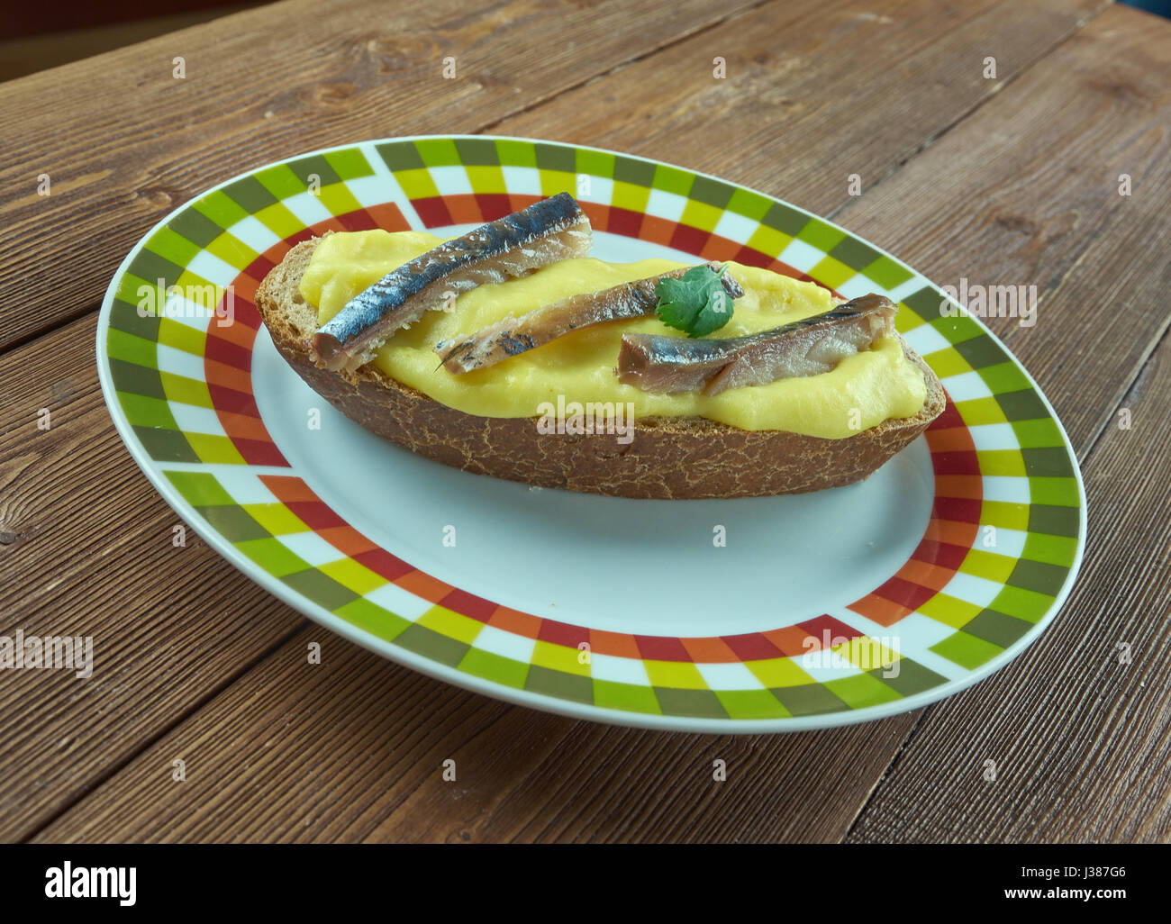 Scotch woodcock savoury consisting of creamy, lightly scrambled eggs