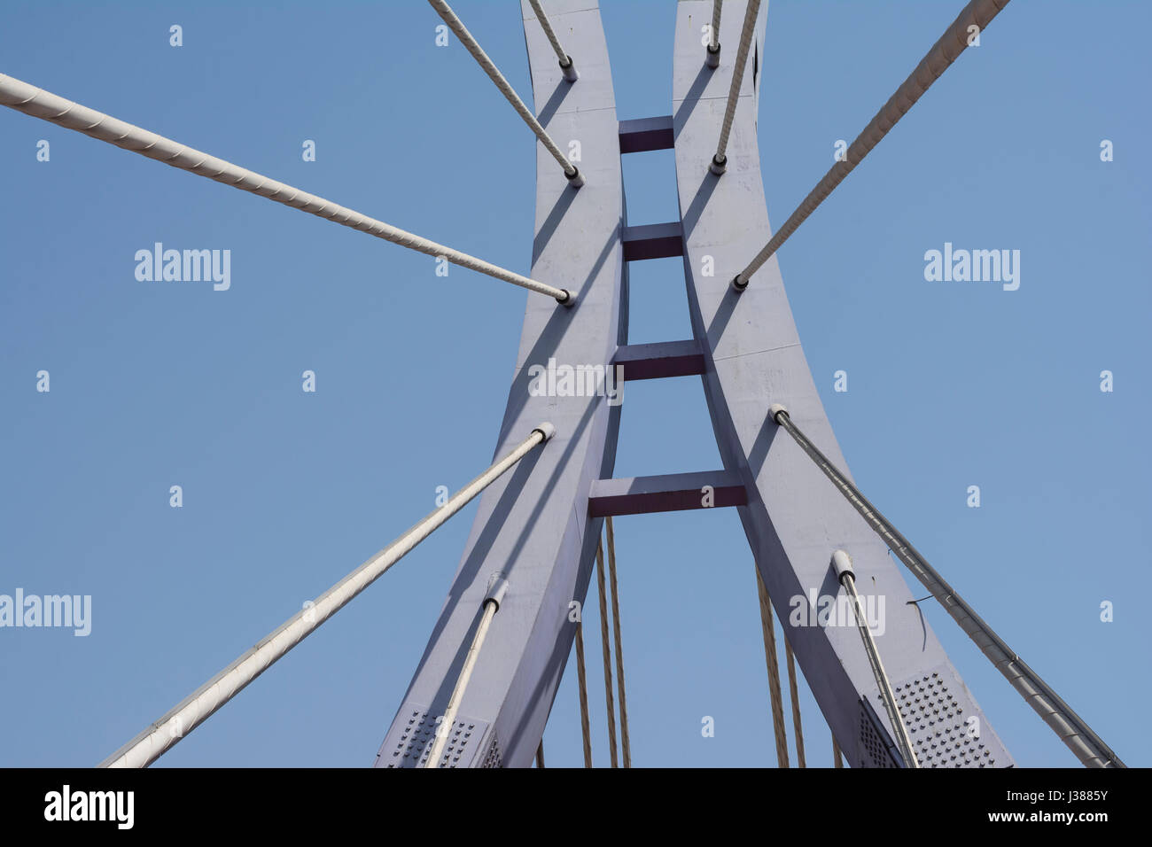 Elements of Modern Bridge in Front Of Blue Sky Stock Photo