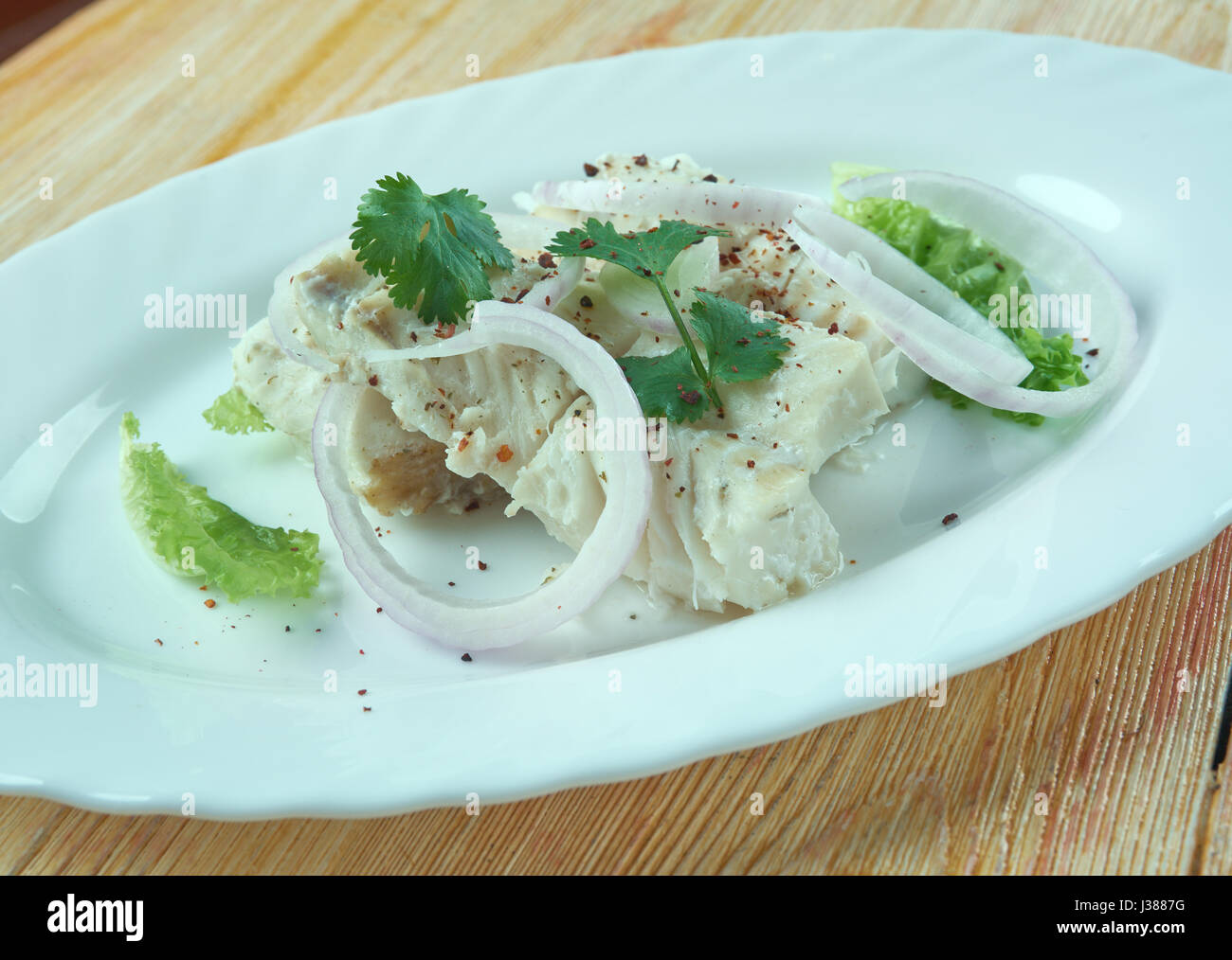 Sea bass ceviche on a White Plate. Stock Photo