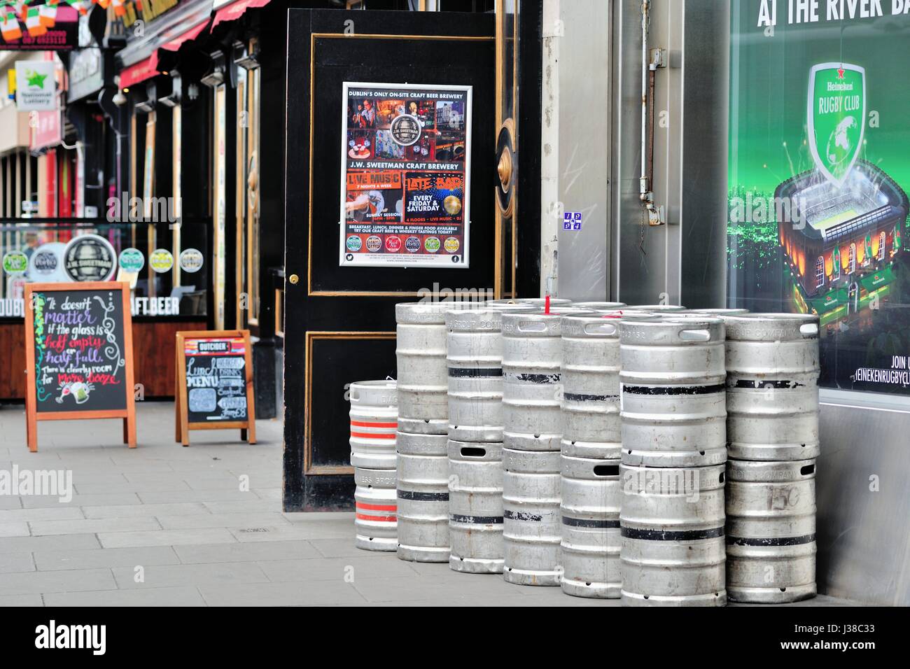 Casks (kegs) of beer sit outside a pub in Dublin's city center. Dublin, Ireland. Stock Photo