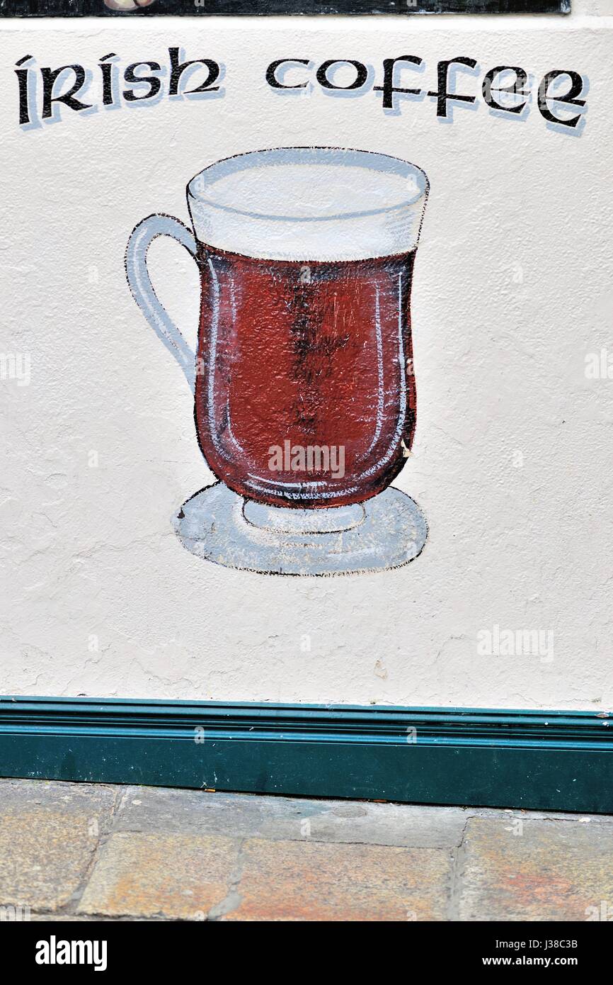 A sign on the side of a pub near the River Liffey and the Temple Bar area offering up a traditional Irish drink. Dublin, Ireland. Stock Photo