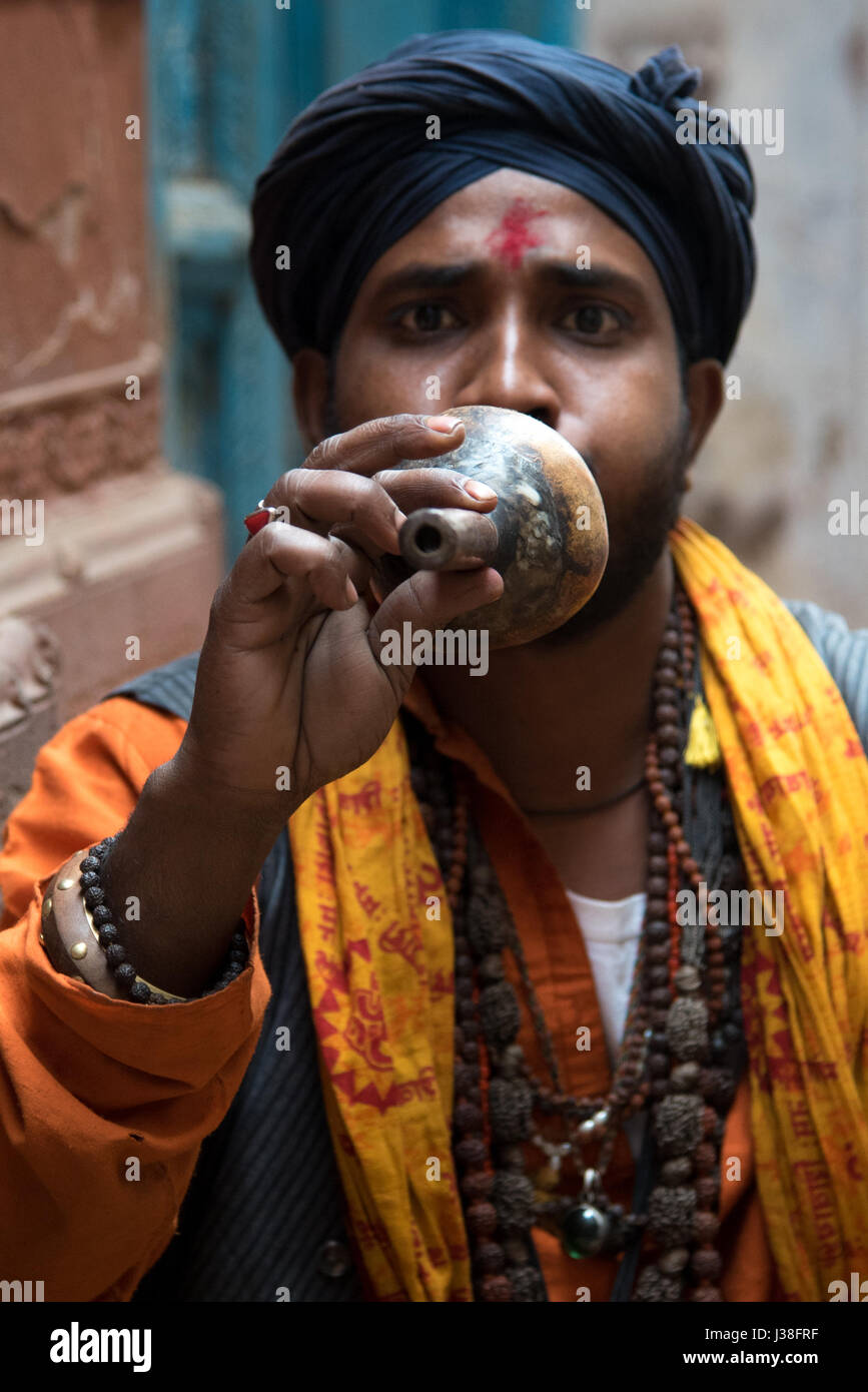 Snake charmer playing his flute in Varanasi, India Stock Photo
