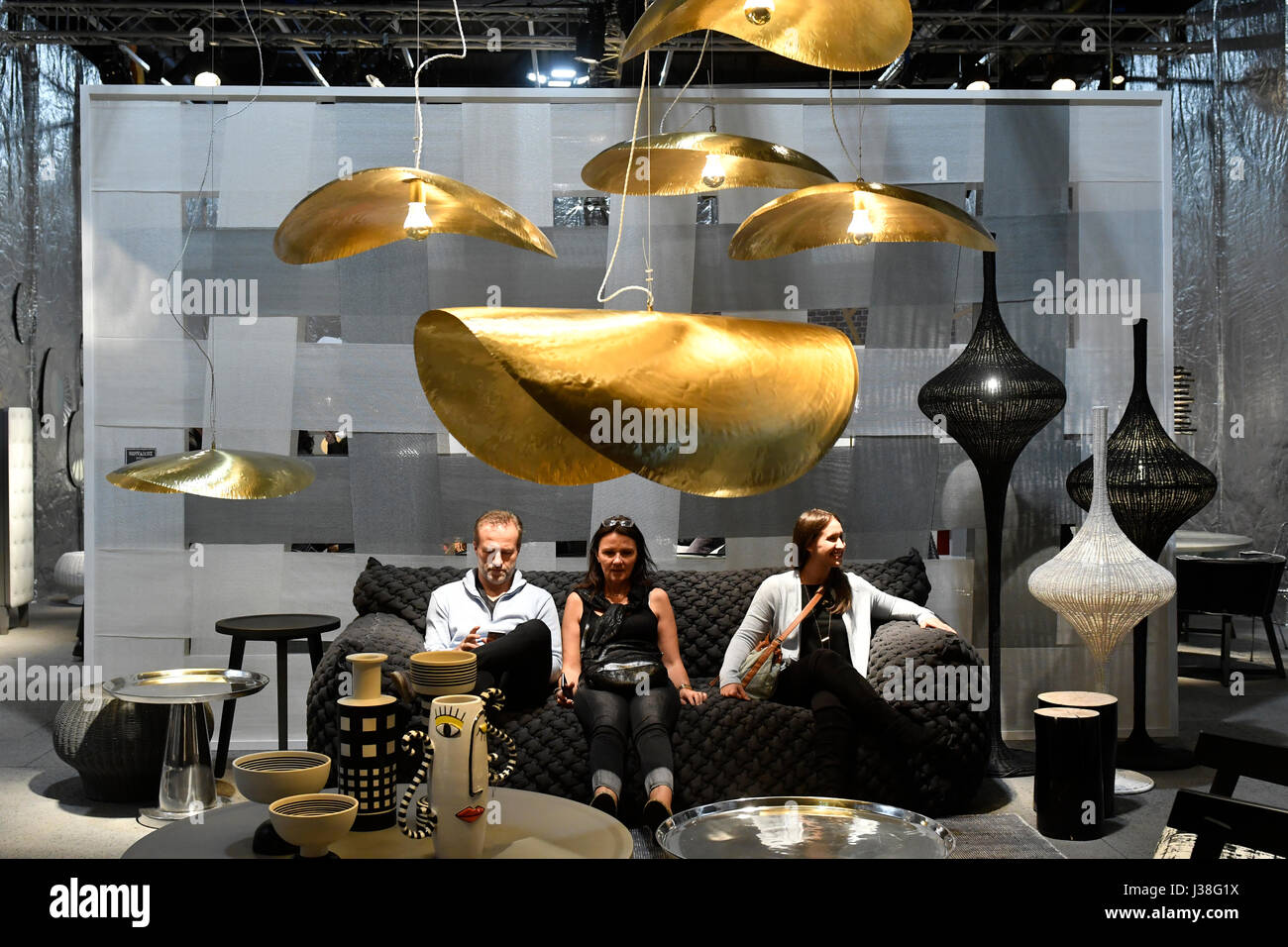 Interior furniture stand during the Fuori Salone, of the international design week fair, Salone del Mobile, in Milan. Stock Photo