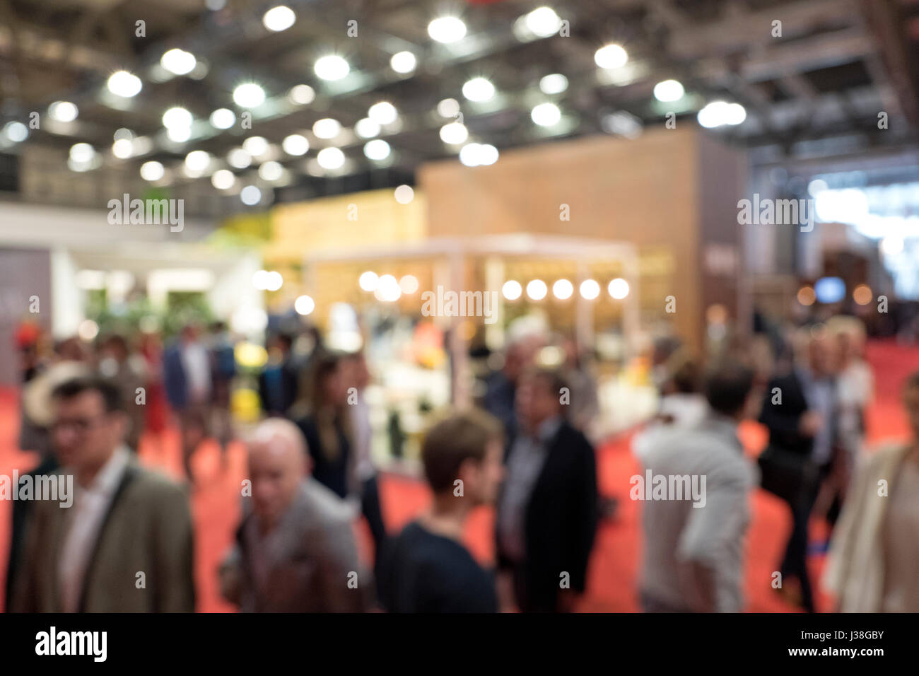 Blurry view of visitar at the design international fair Salone del Mobile, in Milan, Italy. Stock Photo
