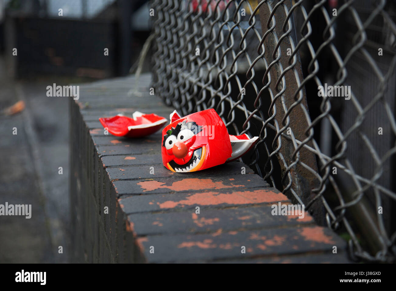 Broken mug of the Animal character from the Muppets on a wall in Birmingham, England, United Kingdom. Stock Photo