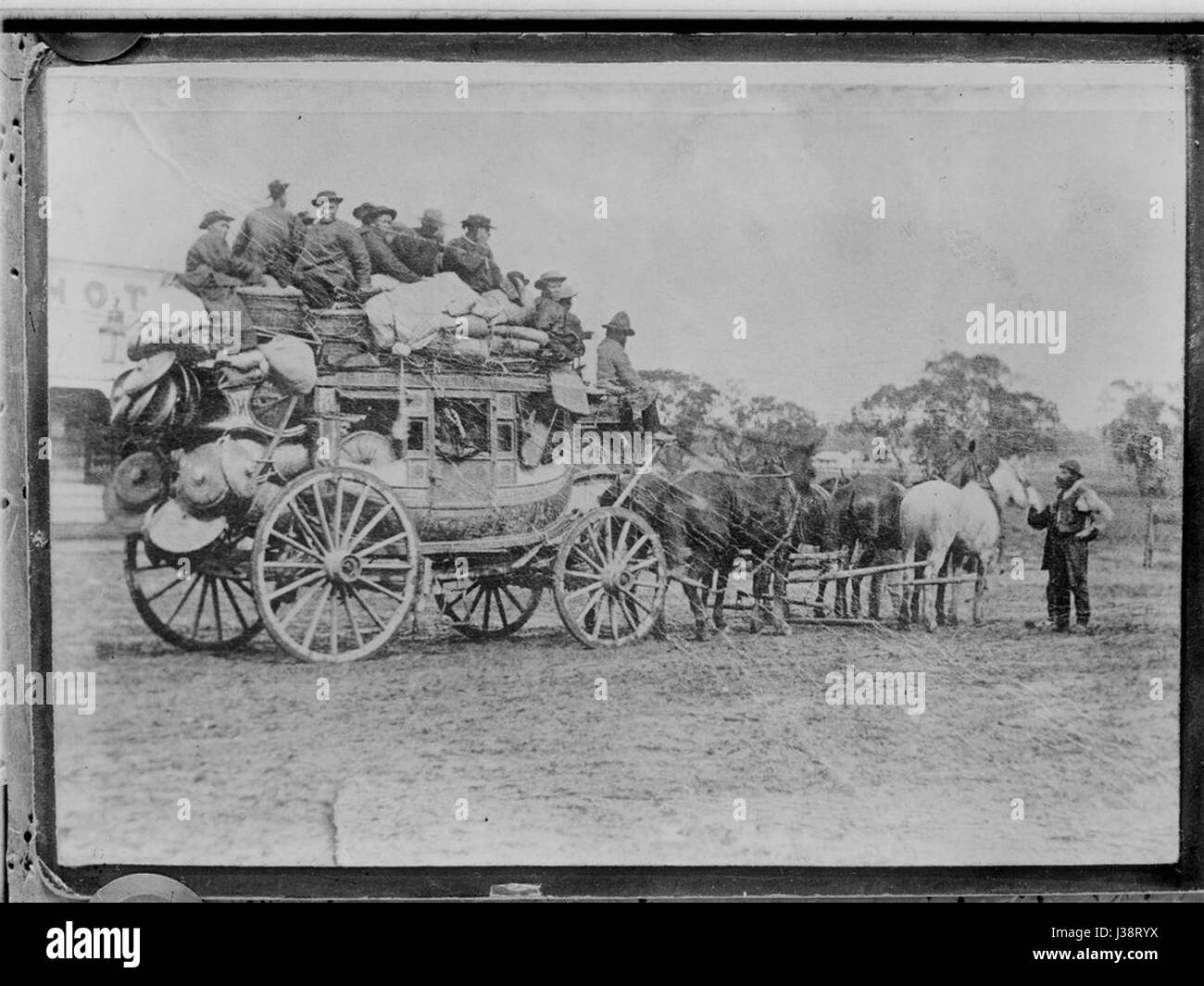 Chinese on stagecoach to goldfields Stock Photo