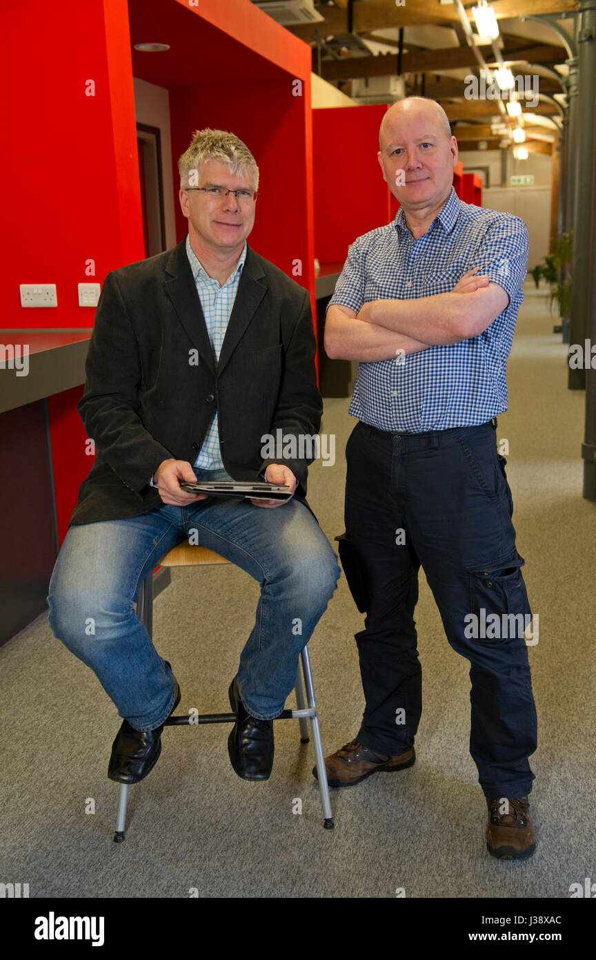 BluWireless Technology Ltd, with Henry Nurser (CEO) in jacket and Ray McConnell (CTO) in shirtsleeves Stock Photo