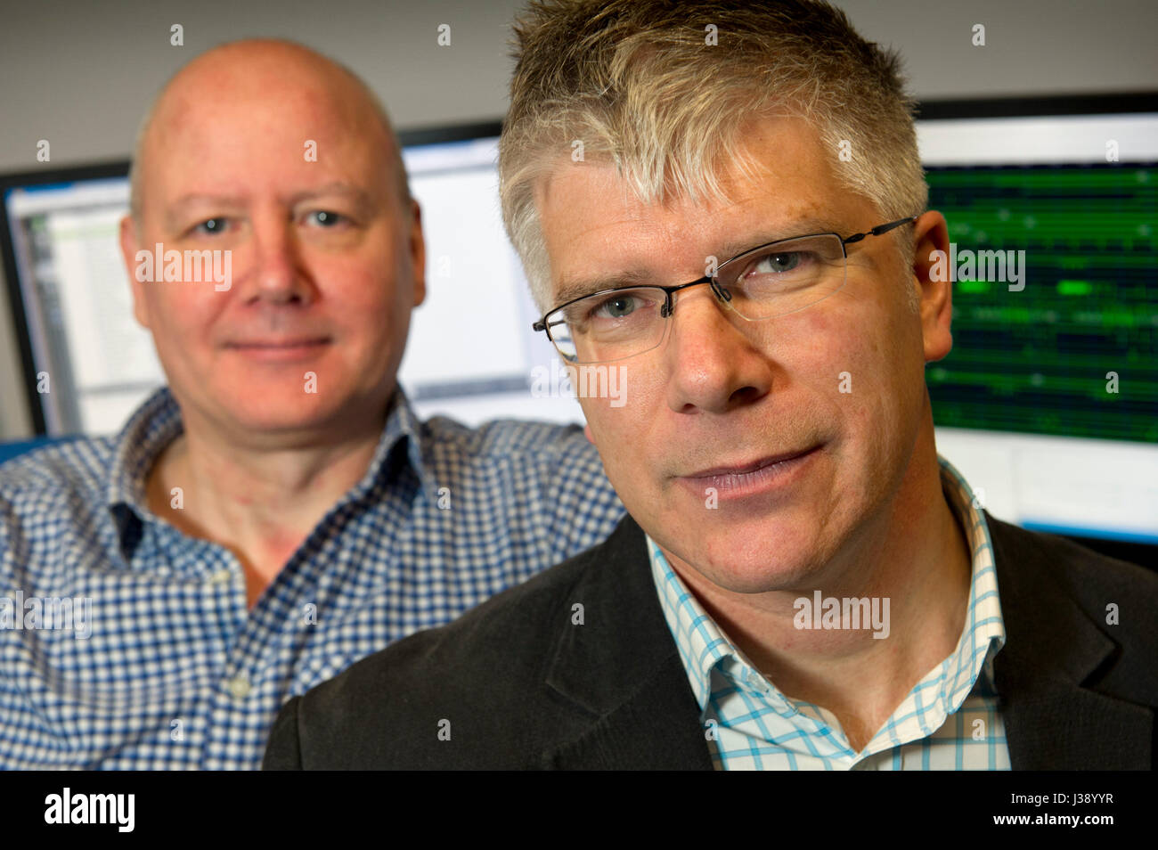 BluWireless Technology Ltd, with Henry Nurser (CEO) in jacket and Ray McConnell (CTO) in shirtsleeves Stock Photo