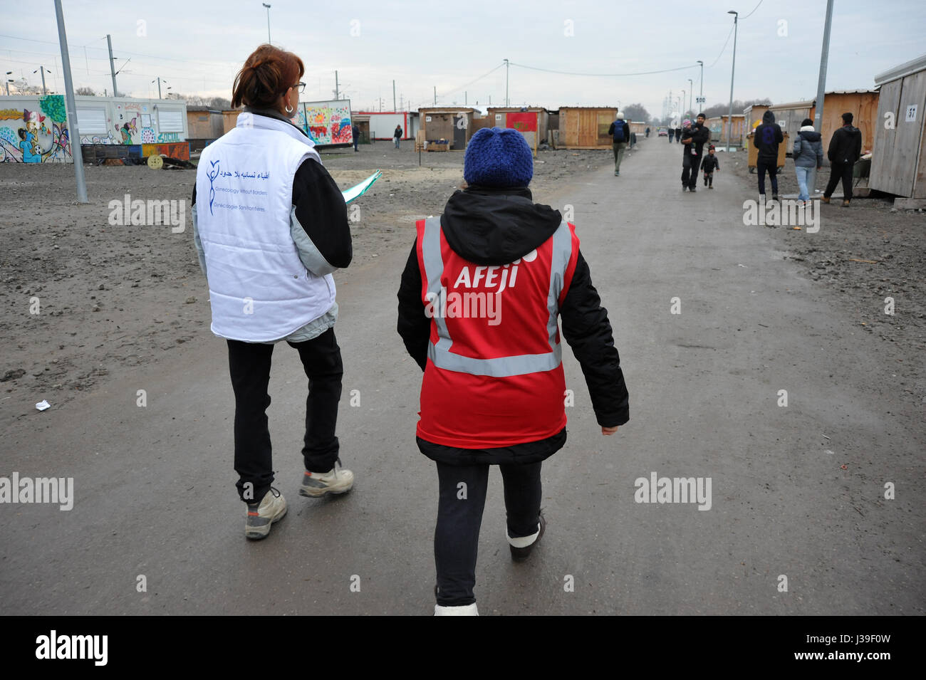 Reportage on volunteers with the french charity, gynecologists without borders who work in refugee camps near calais in the north of france. a midwife and translator looking for patients. Stock Photo