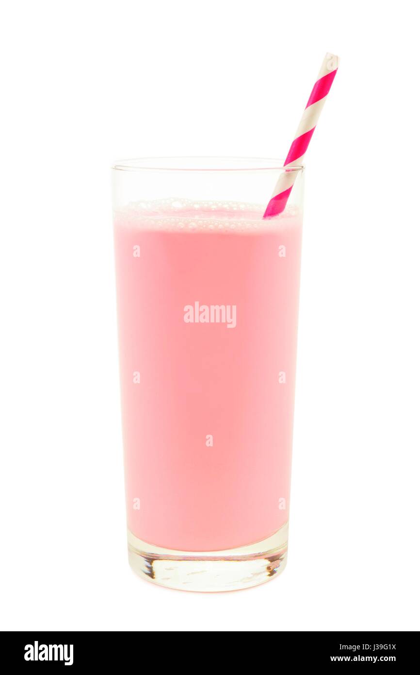 Strawberry milk in a glass with striped paper straw isolated on a white background Stock Photo