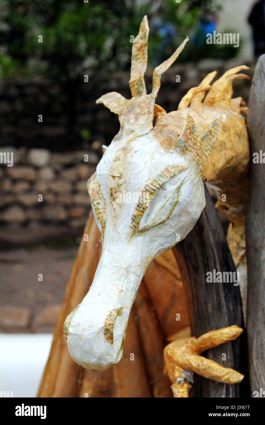 Bodelva, Cornwall, UK - April 4 2017: The story telling chair with dragon at the Eden Project in Cornwall England Stock Photo