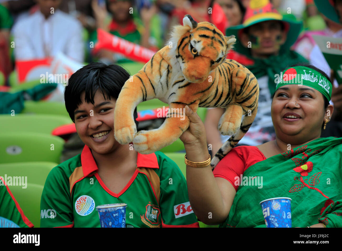 Jubilant cricket fans during the match of the 10th ICC Cricket World Cup at Sher –E- Bangla National Cricket Stadium. Dhaka, Bangladesh. Stock Photo