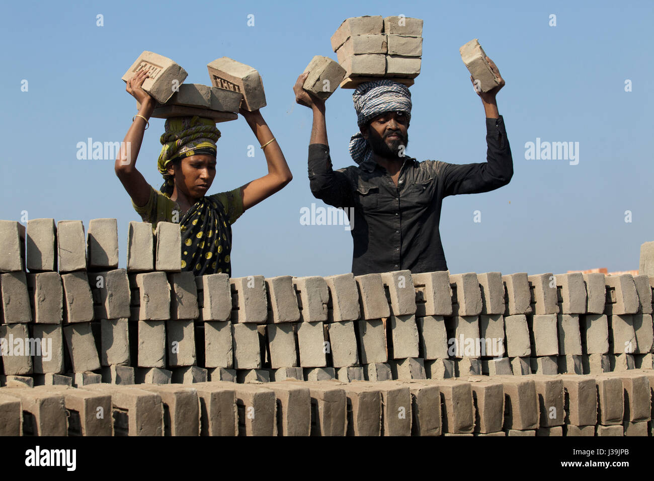 Labourers work at brickfield at Amin Bazar. Dhaka, Bangladesh. Stock Photo