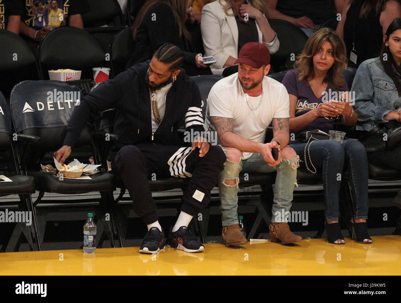 Celebrities watch the Los Angeles Lakers Featuring: Nipsey Hussle Where: Los Angeles, California, United States When: 02 Apr 2017 Stock Photo